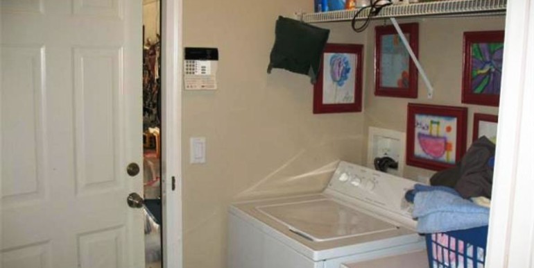 Separate Laundry Room between kitchen and garage has extra close