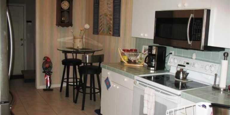 From kitchen sink area looking back toward laundry room, large e