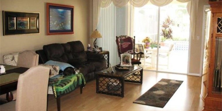 Living/dining room have laminate wood floors and wide view of yo