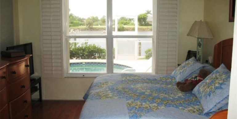 Master Bedroom Suite has wood laminate flooring, plantation shut